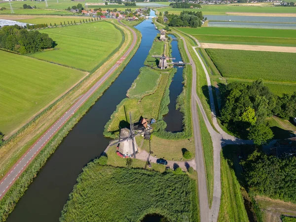 stock image Aerial view with the Strijkmolen windmills in Oterleek. Province of North Holland in the Netherlands