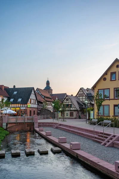 stock image Annweiler, Germany - August 27, 2021: Ensemble at the Schipkapass in Annweiler with the Queich river and remains of the old town wall, Palatinate region in the state of Rhineland-Palatinate in Germany