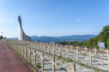 Former Natzweiler-Struthof concentration camp with Lighthouse of Remembrance memorial. Natzwiller in Bas-Rhin department in Alsace region of France clipart