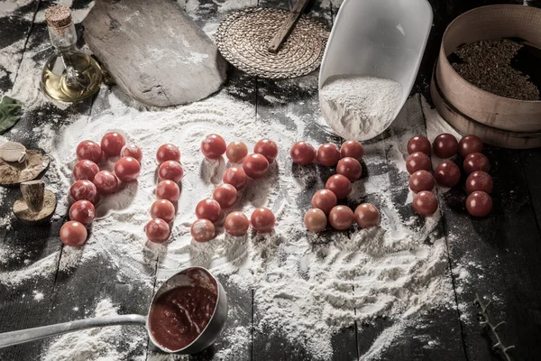 Written Pizza Cherry Tomatoes Table Full Ingredients Flour Tomato Sauce — Stock Photo, Image