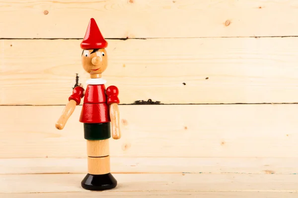 Pinocchio Toy Wooden Background — Stock Photo, Image