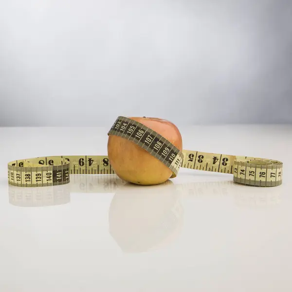 Side View Apple Measuring Tape White Background — Stock Photo, Image