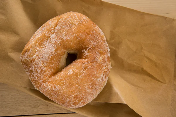 Delicioso Donut Con Azúcar Mesa Madera — Foto de Stock
