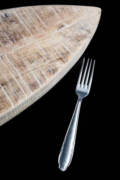 深色底座上的叉子和木板 — 图库照片