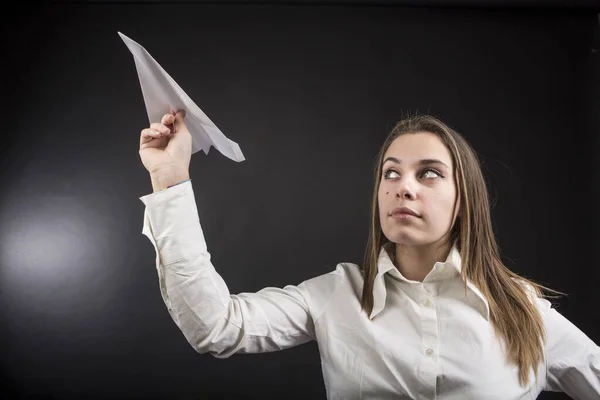 Blonde Girl Launch Paper Airplane Which She Holding Her Right — Stock Photo, Image