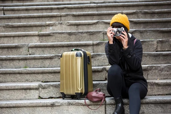 Young Tourist Winter Clothes Sitting Steps Trolley Nearby Takes Picture — Stock Photo, Image