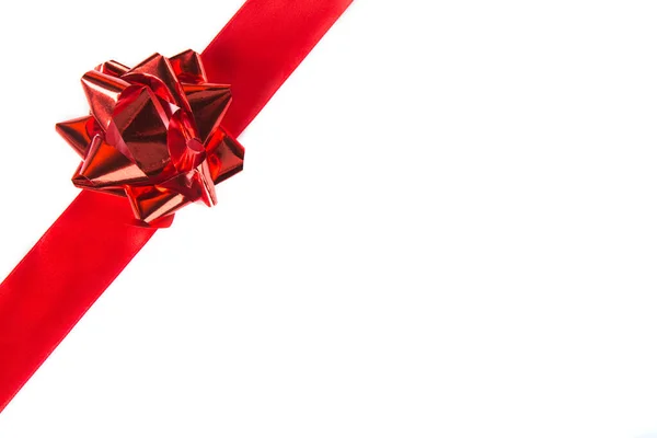 stock image red ribbon with a bow on a white background 