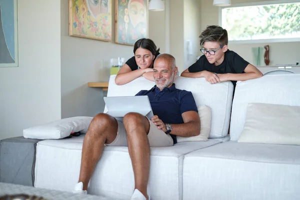 Father His Two Sons Looks Tablet Seriously While Sitting Sofa — Stock Photo, Image