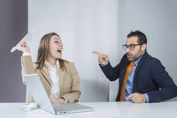 Two Colleagues Sitting Workplace Manager Points His Finger Amused Secretary — Stock Photo, Image
