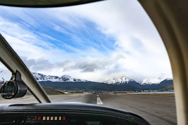 stock image airplane in an airport runway, ready to fly