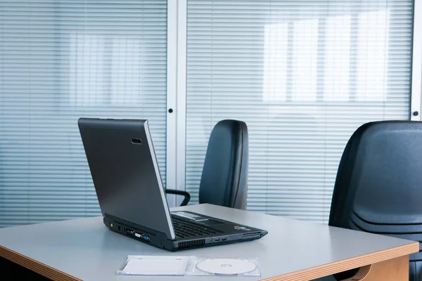 stock image empty office room with computer screen and chair 