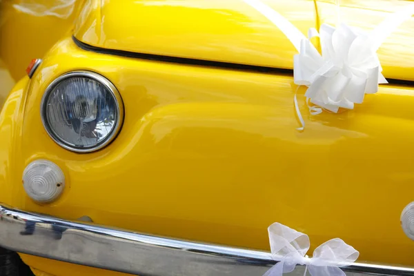 stock image yellow retro car, wedding day 