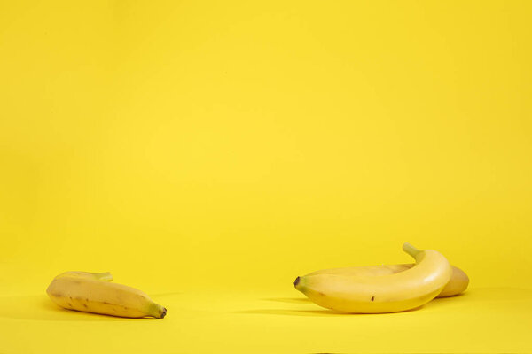 bananas on yellow background 