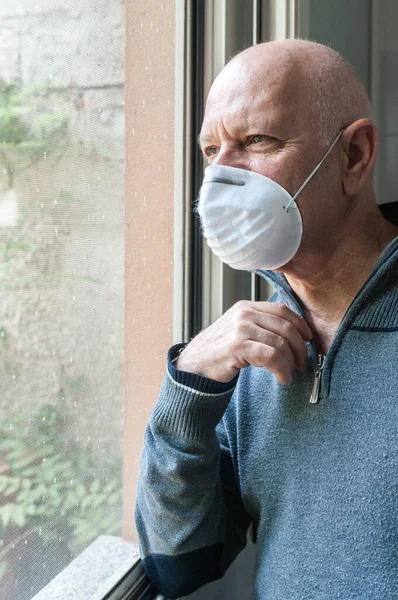 Man Protective Mask Looking Out Window Home — Stock Photo, Image