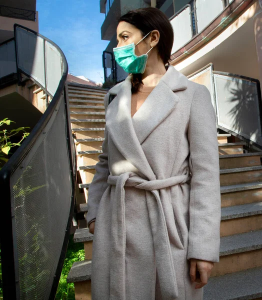 Brunette Girl Coat Protective Face Mask Leaves House Her Building — Stock Photo, Image