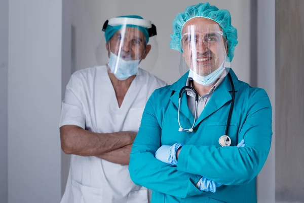 Portrait Two Confident Doctors Wearing Protective Masks — Stock Photo, Image