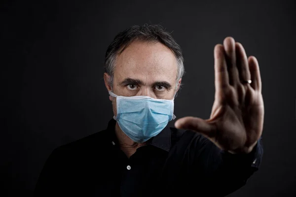 Man Latex Gloves Protective Mask Indicates Stop His Hand Isolated — Stock Photo, Image