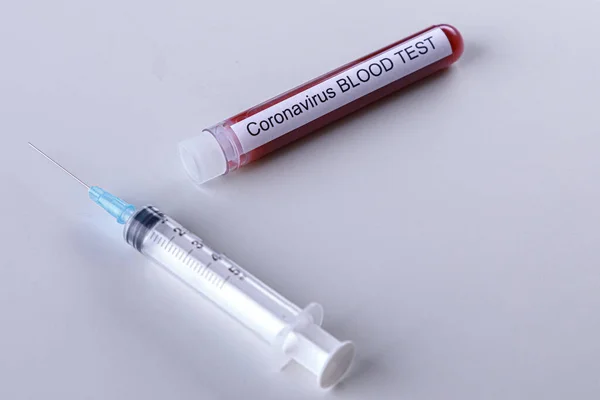 Syringe Test Tube Blood Related Coronavirus Isolated Blue Background — Stock Photo, Image