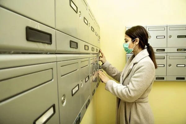 Brunette Girl Coat Checks Mail Mailbox Protective Face Mask — Stock Photo, Image