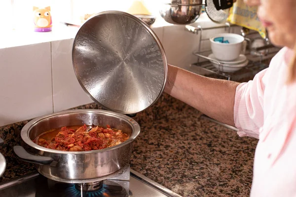 Detail Pot Sauce Being Cooked Lifted Expert Hands Lady — Stock Photo, Image