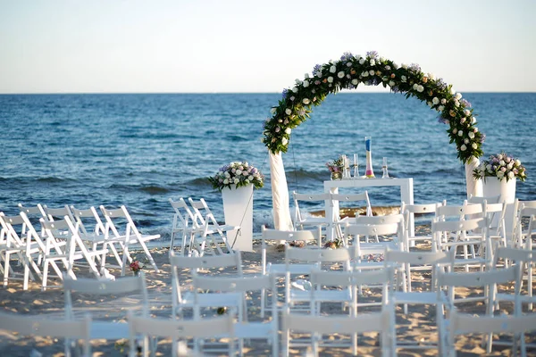 Setting up a wedding by the sea
