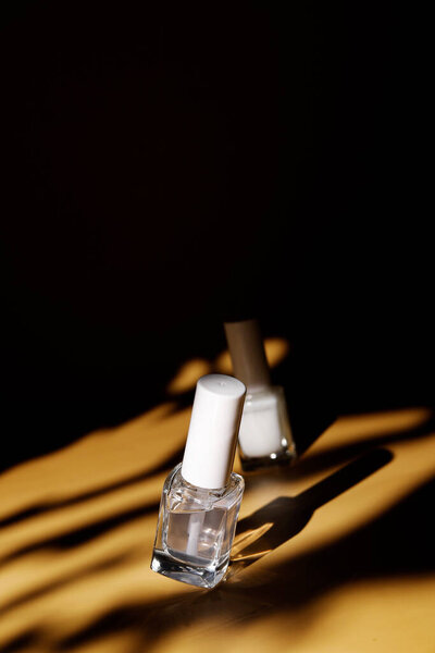 protective nail polish and shine in the summertime sand background