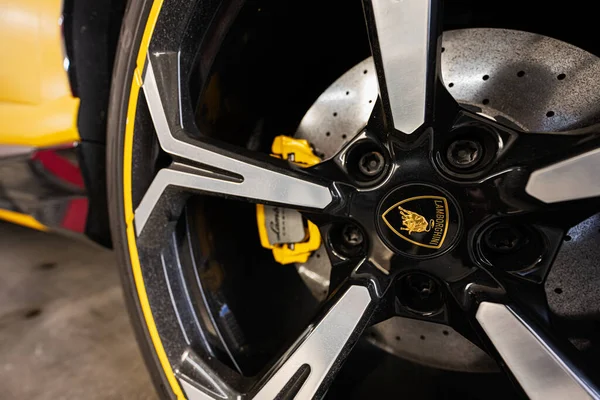 stock image Ternopil, Ukraine- November 11, 2022:  Car wheel of yellow Lamborghini Urus.