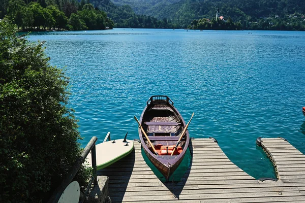 stock image Wooden boat in pier of beautiful Bled Lake, Slovenia.