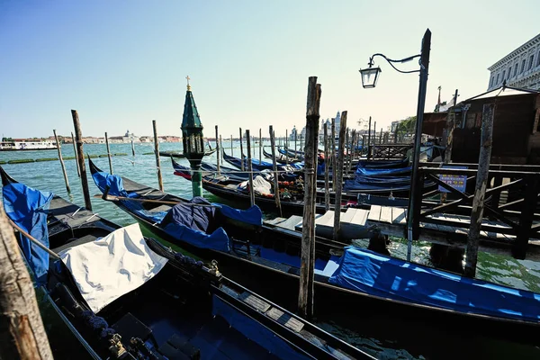 Gondolas Docked Tied Poles Harbour Saint Marks Venice Italy — Stock Photo, Image