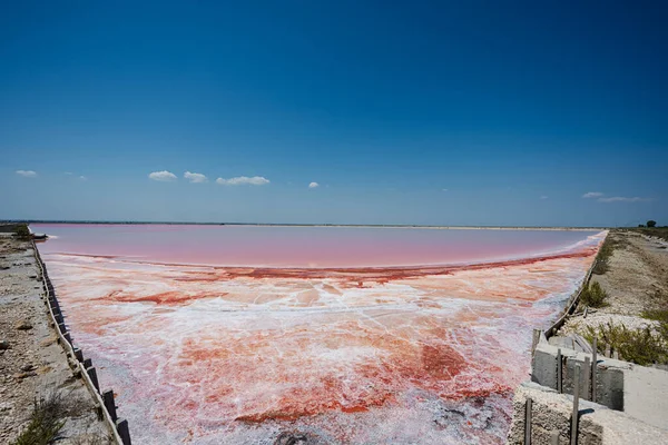 Red salt lake in Saline Margherita di Savoia of Italy.