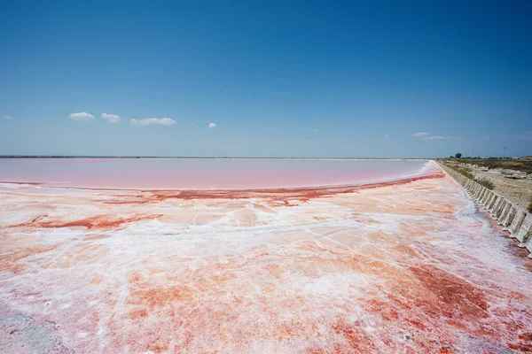 stock image Red salt lake in Saline Margherita di Savoia of Italy.