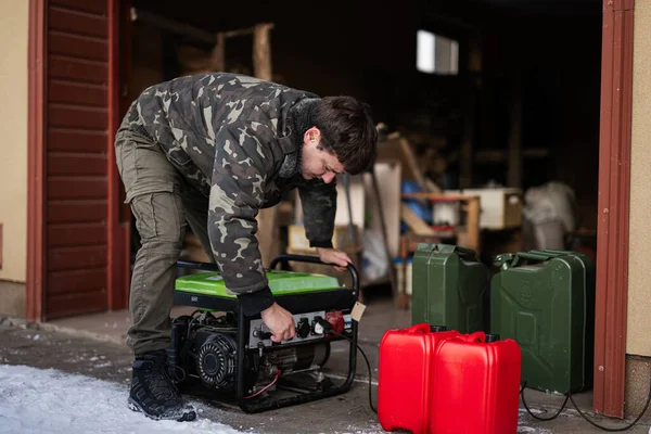 Man Wear Military Jacket Gasoline Portable Mobile Backup Standby Generator Royalty Free Stock Photos