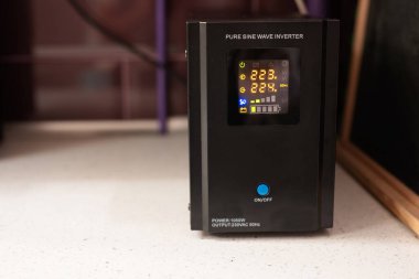 Pure sine wave inverter. Backup Power UPS 1000 W with stabilizer for home.