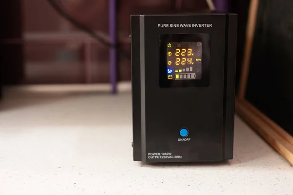 Pure sine wave inverter. Backup Power UPS 1000 W with stabilizer for home.