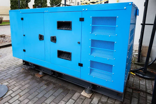 Blue mobile diesel generator for emergency electric power.