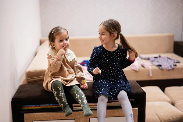 Two Sisters Sit Sofa Tell Share Girlish Secrets Each Other — 스톡 사진