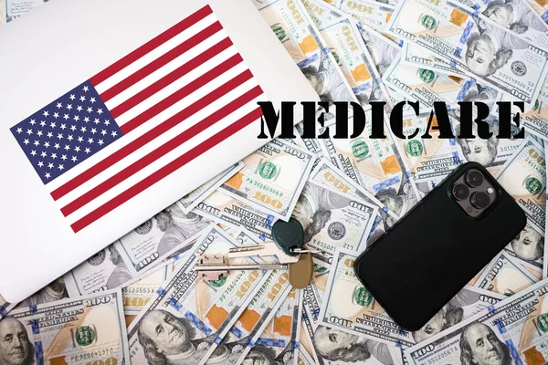 Medicare Concept Usa Flag Dollar Money Keys Laptop Phone Background — Stock Photo, Image
