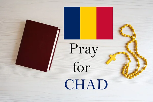 stock image Pray for Chad. Rosary and Holy Bible background.