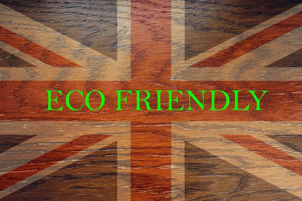 英国国旗挂在木制背景上 以促进全球生态友好型环境 生态和环境保护以及绿色国家的理念 — 图库照片