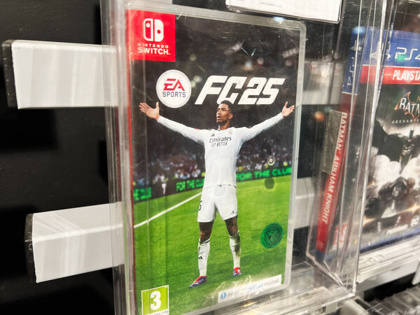 Kyiv, Ukraine - February 09, 2025: Shelf display of the FC 25 video game cover for the Nintendo Switch.