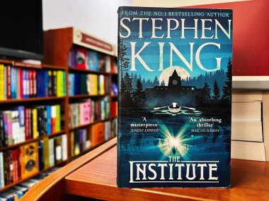 Lviv, Ukraine - February 20, 2025: Close-up of 'The Institute' book cover by Stephen King displayed in a bookstore. clipart