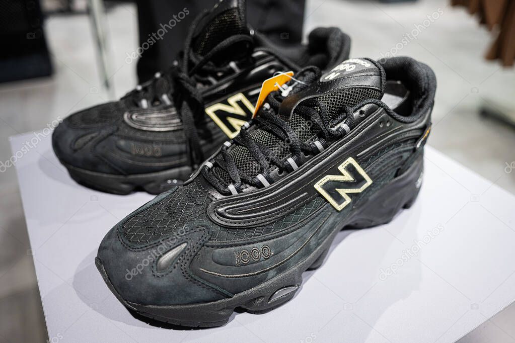 Khmelnytskyi, Ukraine - April 16, 2025: High-quality black designer New Balance 1000 athletic shoes displayed on a white surface indoors