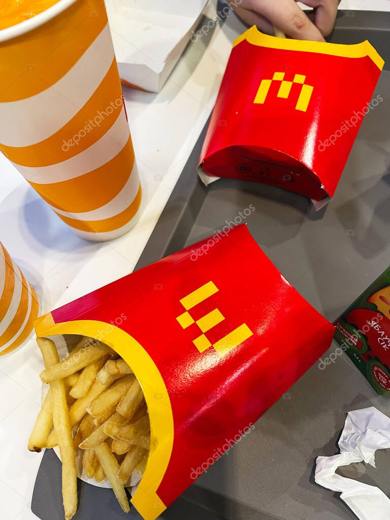 Ternpil, Ukraine - April 23, 2025: A fast food McDonald's tray with Minecraft French fries, a soft drink, and a ketchup packet.