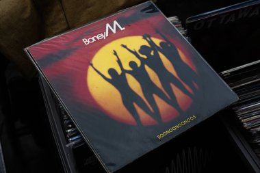 Lviv, Ukrayna - 13 Mayıs 2025: Boney M. Boonoonoos 1981 vinil albüm turuncu siluet kapaklı, disko tarzı.