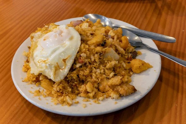 spanish food called migas (shepherd's breadcrumbs)
