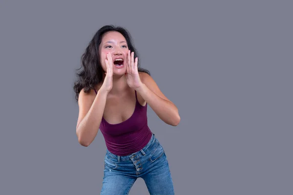 Young Asian Woman Yelling Gesture Hands Her Mouth Isolated Gray — Stock Photo, Image