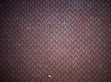 Elmas desenli metal döşeme. Siyah metal arka plan veya siyah çelik yüzey.