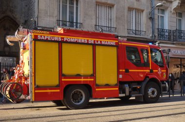 Toulouse, France - Feb. 2023 - A Renault Master transformed into an ambulance with the rescue and fire center; the red and yellow vehicle is marked with the 