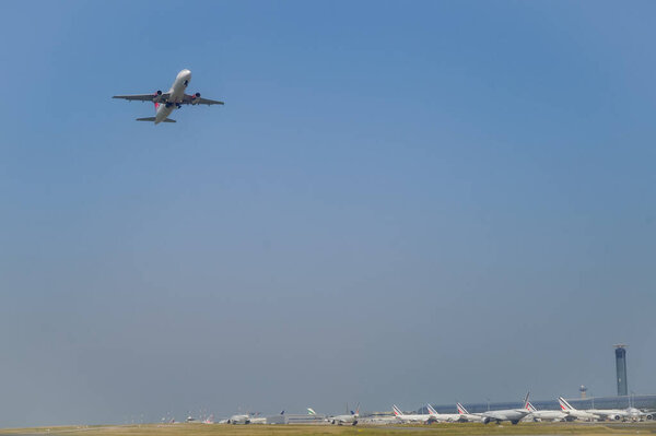 airplane landing in airport, travel concept