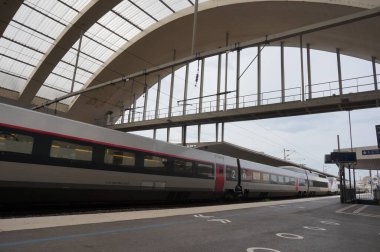 train station with train in the city